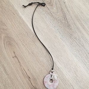 Free with purchase! Necklace with bear paw charm.